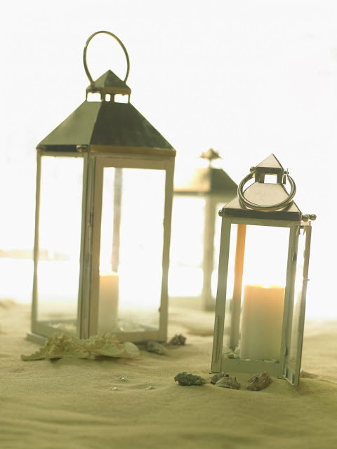 beach wedding candles in glass vases aisle runners